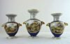 Davenport porcelain garniture of 3 vases - with camel head decoration