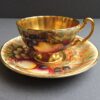 Aynsley china Orchard cup and saucer gold interior