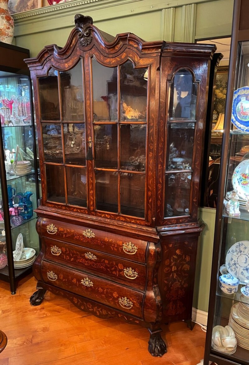 18th Century Dutch marquetry cabinet with bombay shape base and lion paw feet