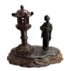 meiji period bronze grouping of a geisha beside later. Signed