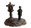 meiji period bronze grouping of a geisha beside later. Signed
