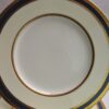 dinner plates in blue and gold by Minton