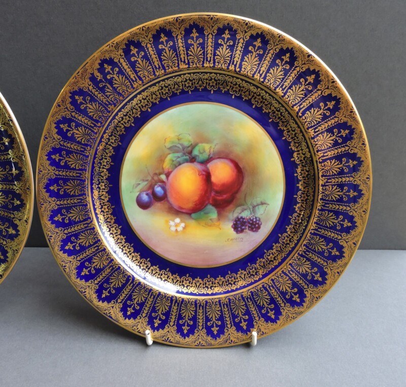 close up paragon fruit plates signed J Martin