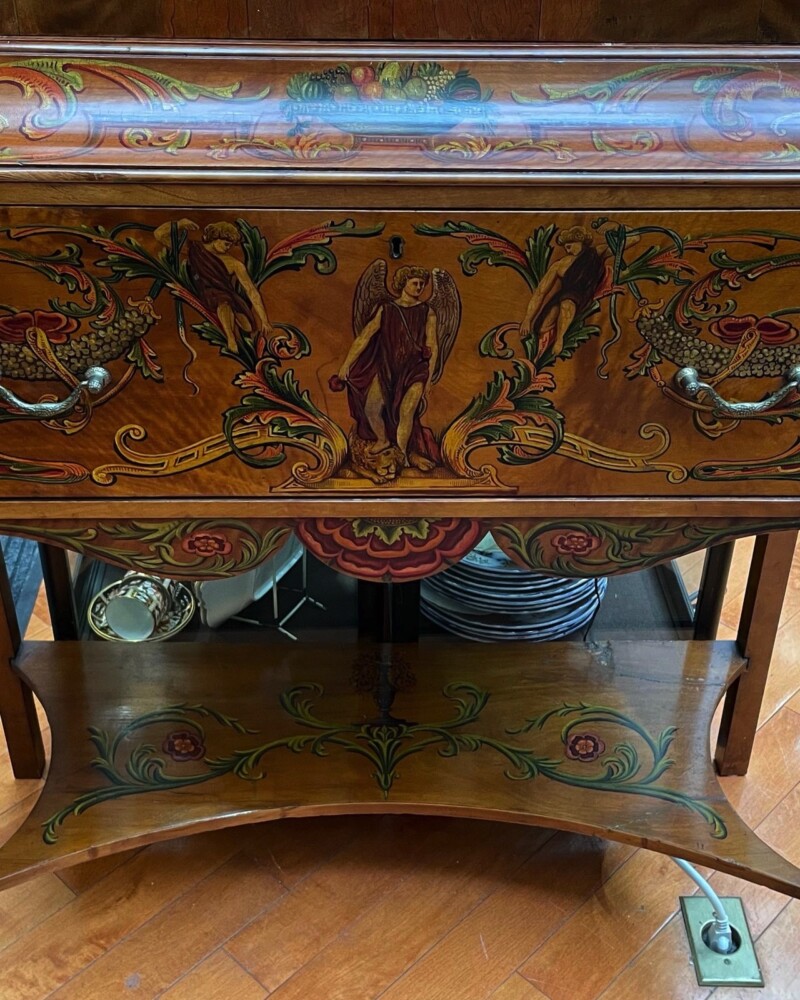 handpainting over satinwood desk